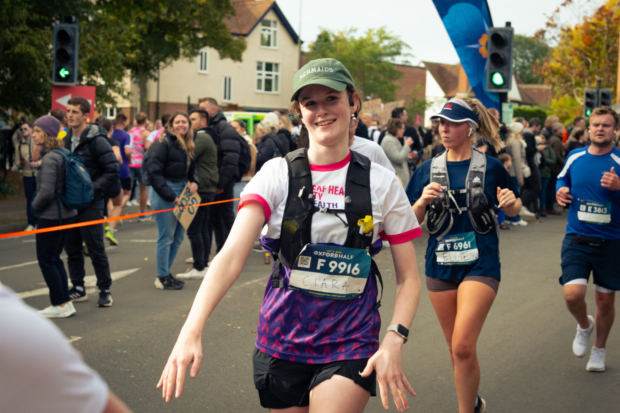 female in running signhealth running t shirt