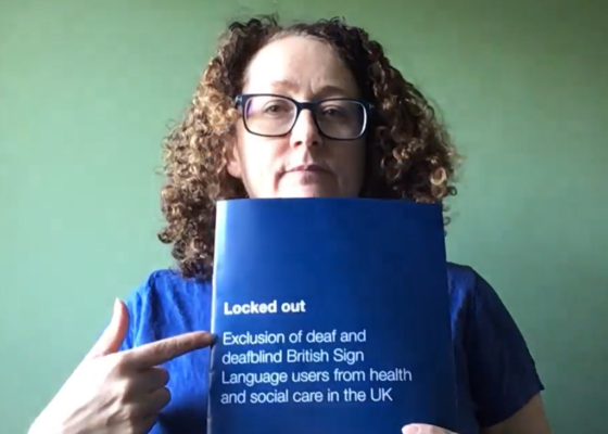 Woman pointing to printed report